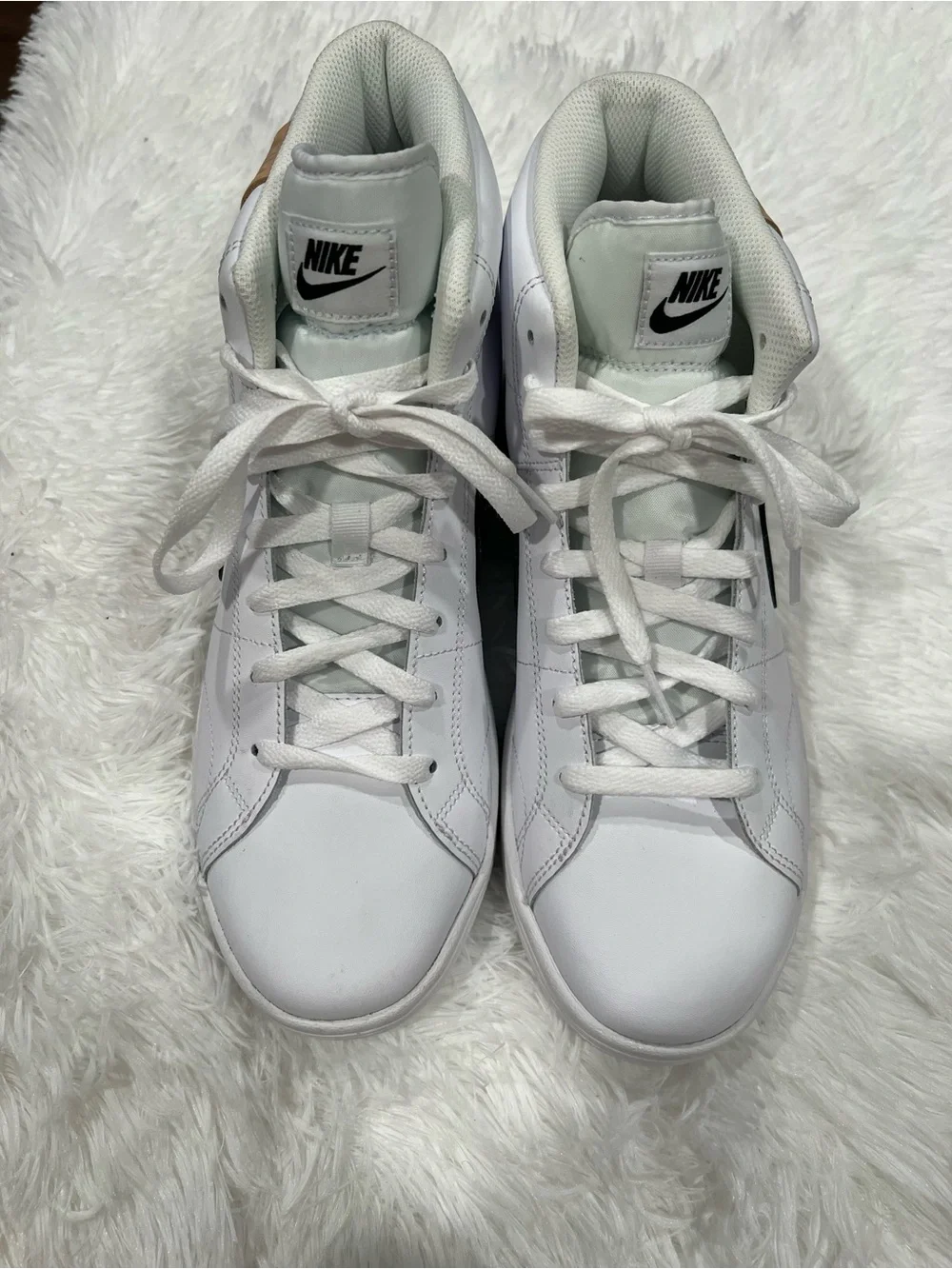 Nike White High-Top Sneakers with Black Swoosh and Tan Heel Tab